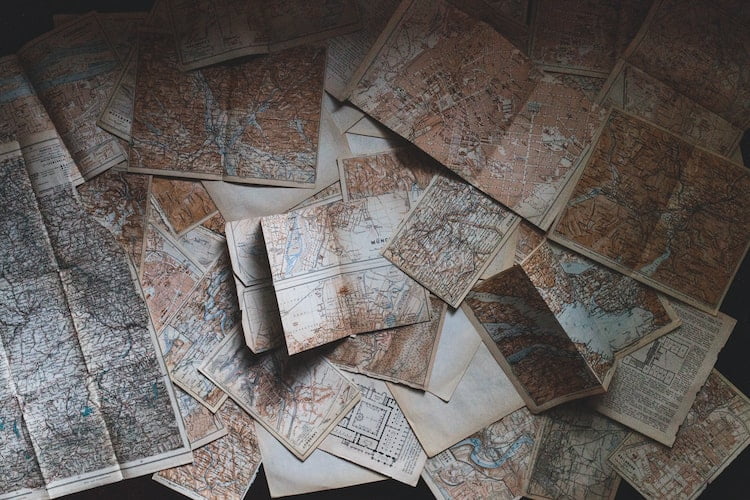 Photo by Andrew Neel maps lying on the floor